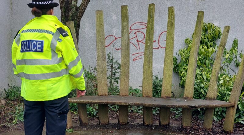 Totnes Police looking over some grafitti tags in The Rotherfold Totnes