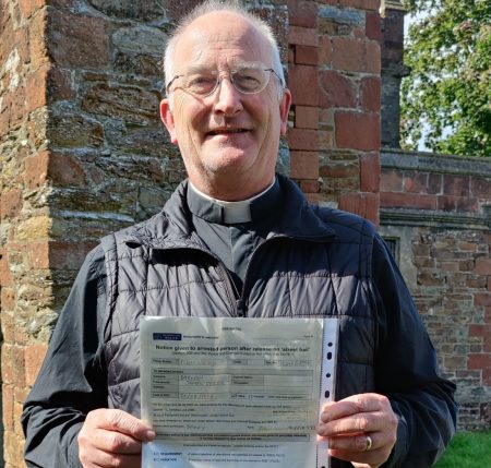 Father Jim with hiis Street Bail. Image by Peter Shearn