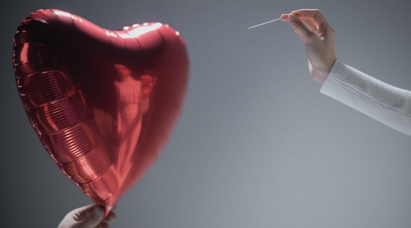Photo by cottonbro studio: https://www.pexels.com/photo/person-holding-red-heart-balloon-7670313/