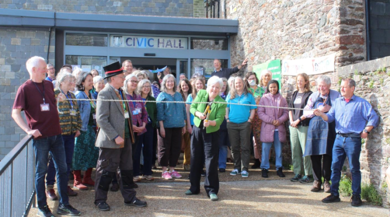 MP Caroline Voaden officially opens ShareFest Totnes 2026 — using a pair of loppers borrowed from the Share Shed — at Totnes Civic Hall on Saturday 18th April. Photo credit: Share Shed