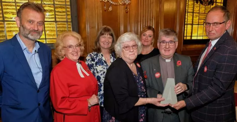The team at Providence Chapel collects their Award from Hugh Dennis and Canon Ann Easter. Credit Mike Swift