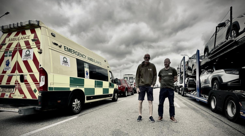 Team leaders Pete and Adam with the latest convoy at the Ukrainian border. Photo by Jimmy Edmonds.